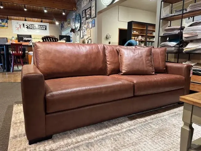 Luxe top-grain leather sofa on the showroom floor